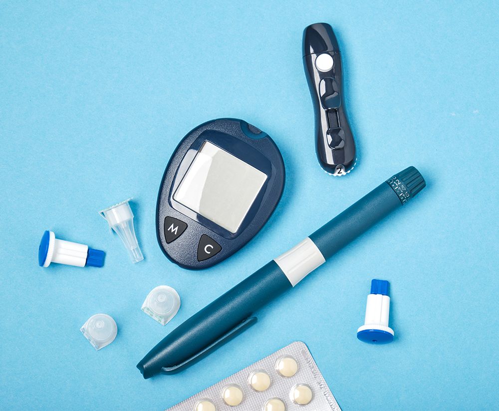diabetic set of glucose meter monitor, lancet with spare needles, syringe pen for injecting insulin and tablets